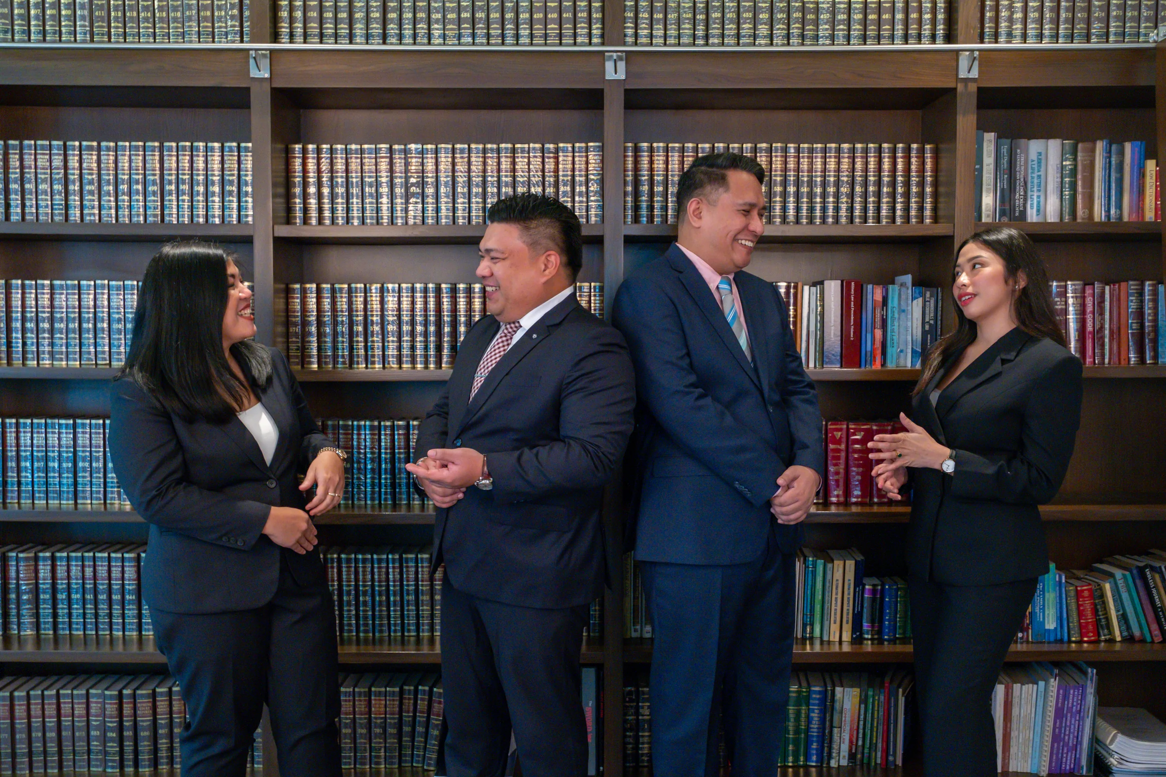 Gaspar Cañeba Franco lawyers in conversation in the library